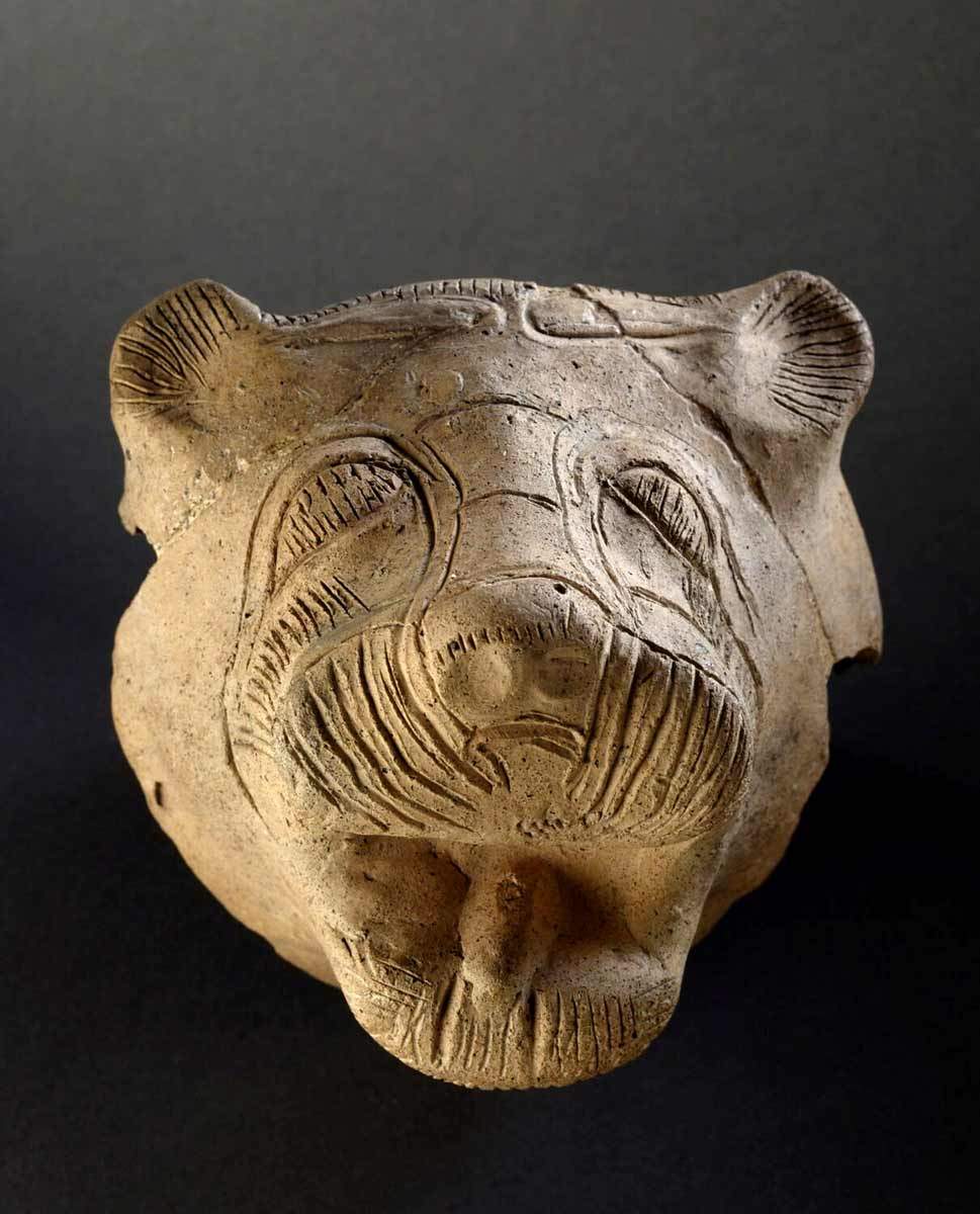 terra cotta lion ugarit