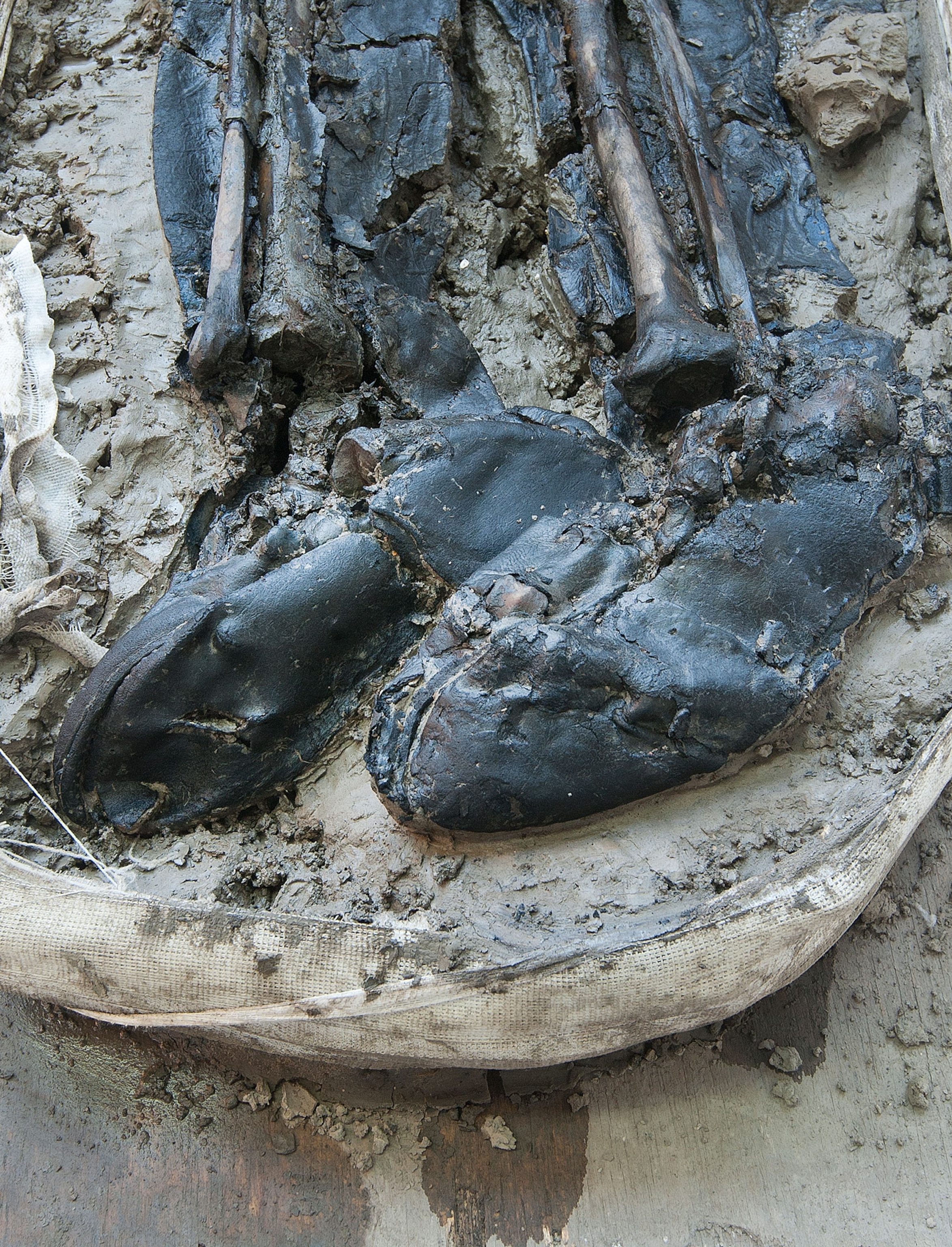 This medieval skeleton died with his boots on