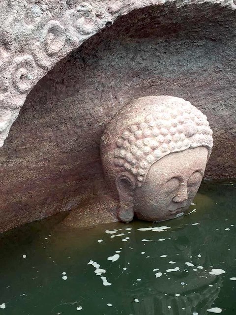 600-year-old Buddha Statue Emerges from Chinese Reservoir | Buddhistdoor