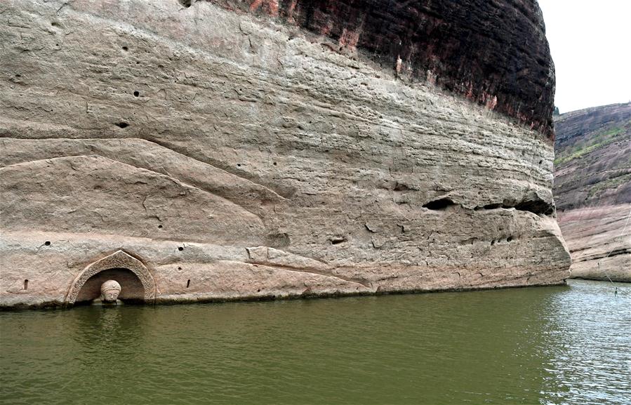 Ancient Buddha found as water level of reservoir lowers in E China[8]- Chinadaily.com.cn