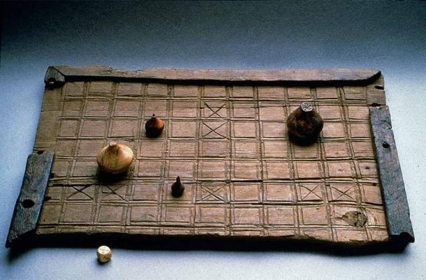 Ancient Hnefatafl board game, a precursor to Tablut, dating back to 1100s and discovered in the 1980s in Norway. (CC BY 2.0 DEED / NTNU Vitenskapsmuseet)