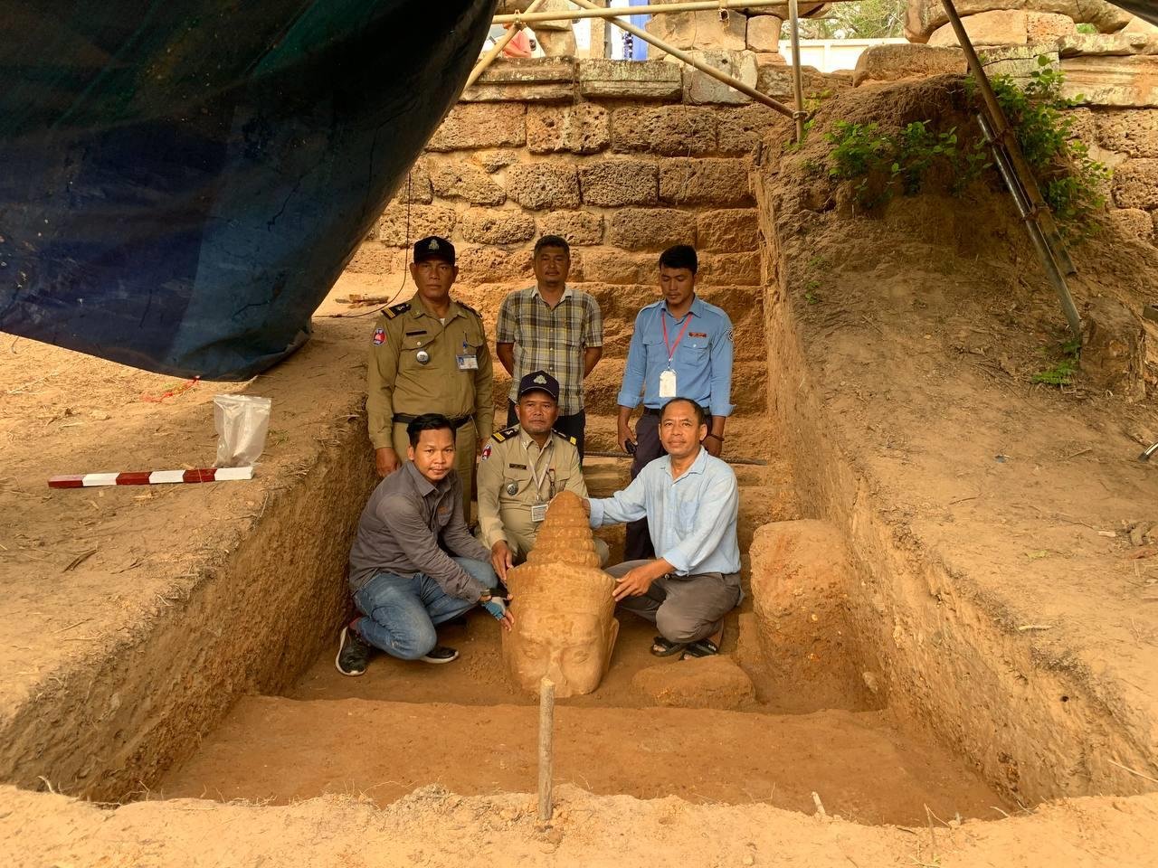 Missing head of Deva statue unearthed at Cambodia's Angkor Thom