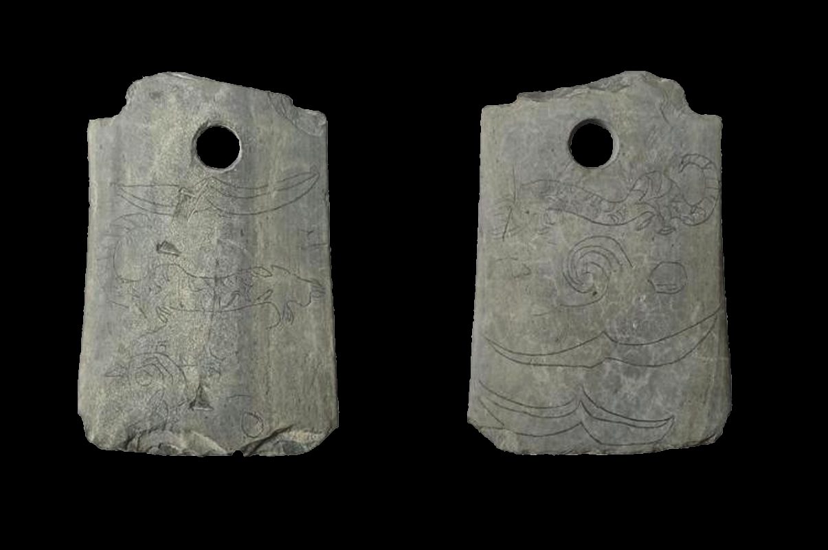 Archaeologists uncover 4,500-year-old ritual weapon engraved with tigers