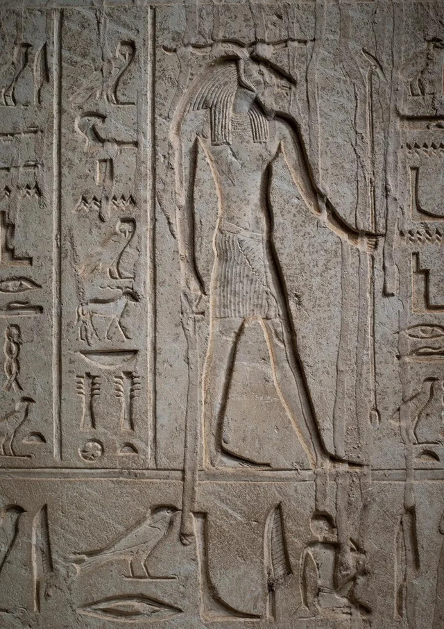 A Detailed Engraving of the Egyptian God Banebdjedet Graces the Side of the Sarcophagus, Reflecting Divine Protection