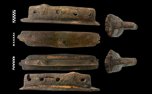 A fascinating T-shaped artifact with four holes, linked to Canoe Marmotta 1 and dated using radiocarbon analysis, is on display at the Museo delle Civiltà in Rome.