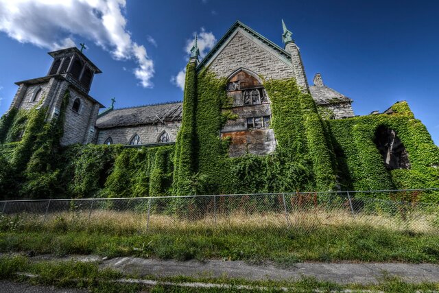 Abandoned mansions reveal the power of nature, as ivy and roots weave through forgotten halls.