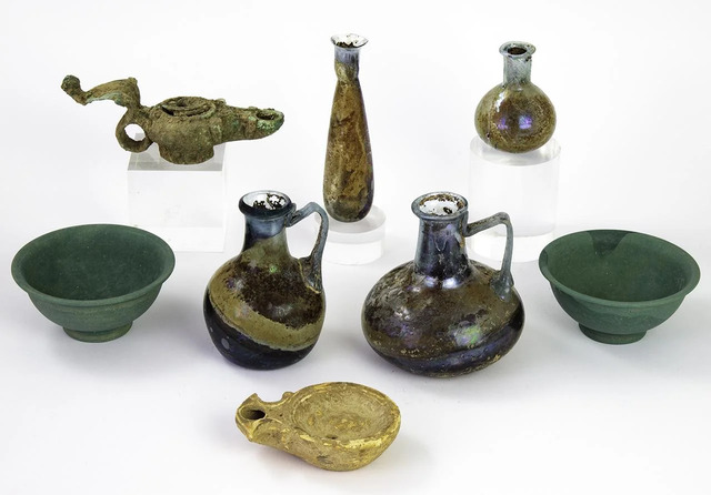 An Exquisite Collection of Vases and Lamps Carefully Placed Inside a Roman Tomb