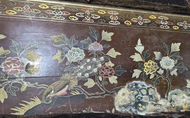 Delicate Details of Flowers and Birds Beautifully Painted on the Coffin