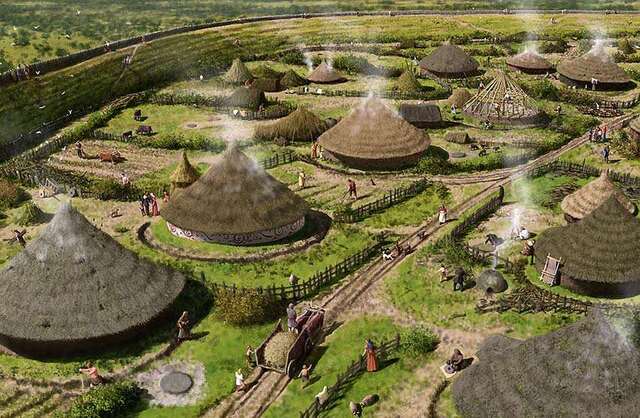 Imagine life in the middle Iron Age—roundhouses nestled within the hillfort, as captured in this artistic reconstruction.