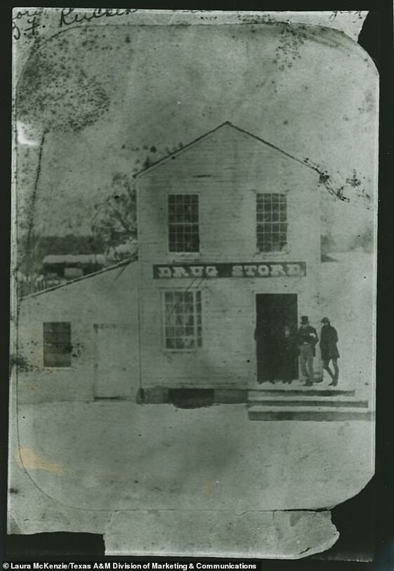 The picture here is one of the few remaining images of the town, featuring a drug store that once served its bustling community.