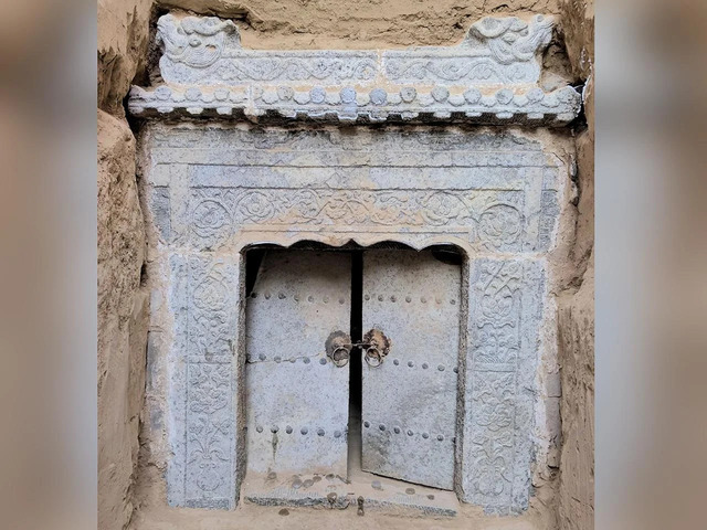 The Entrance of the Tomb and a Glimpse Into Its Intricate Interior