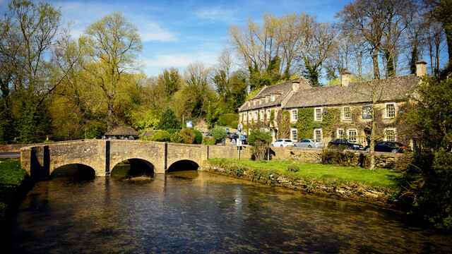 The River Coln flows gently through the village, providing a tranquil backdrop to its charming streets.