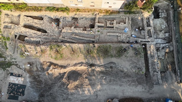 The preserved stone wall, spanning a significant length, is an impressive example of Hellenistic architecture