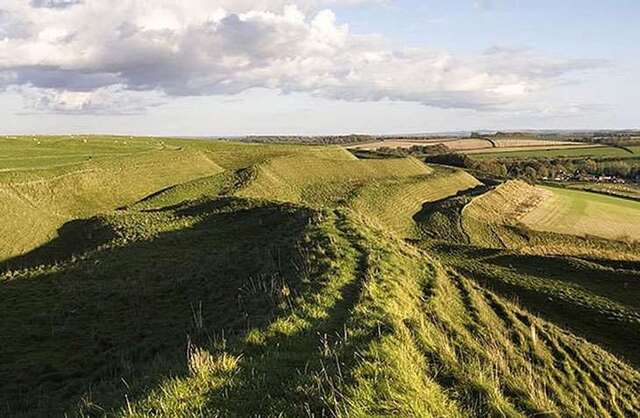 Today’s view along the mighty ramparts of Maiden Castle offers a powerful connection to its storied past.