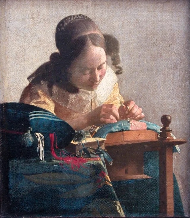 The Lacemaker - Johannes Vermeer's delicate portrayal of a young girl focused on her lacework, a gem of Dutch Baroque art