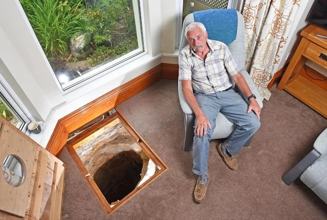 Sitting next to the ancient well he uncovered, Colin Steer contemplates the remarkable historical significance of his discovery