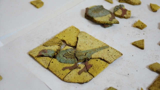 A vivid bird mosaic, pieced together from ancient fragments, bringing history to life