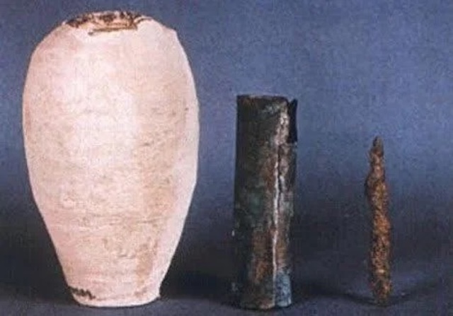 The actual components of the Baghdad Battery, with the ceramic pot, copper cylinder, and iron rod, a 2,000-year-old device that still puzzles scientists today