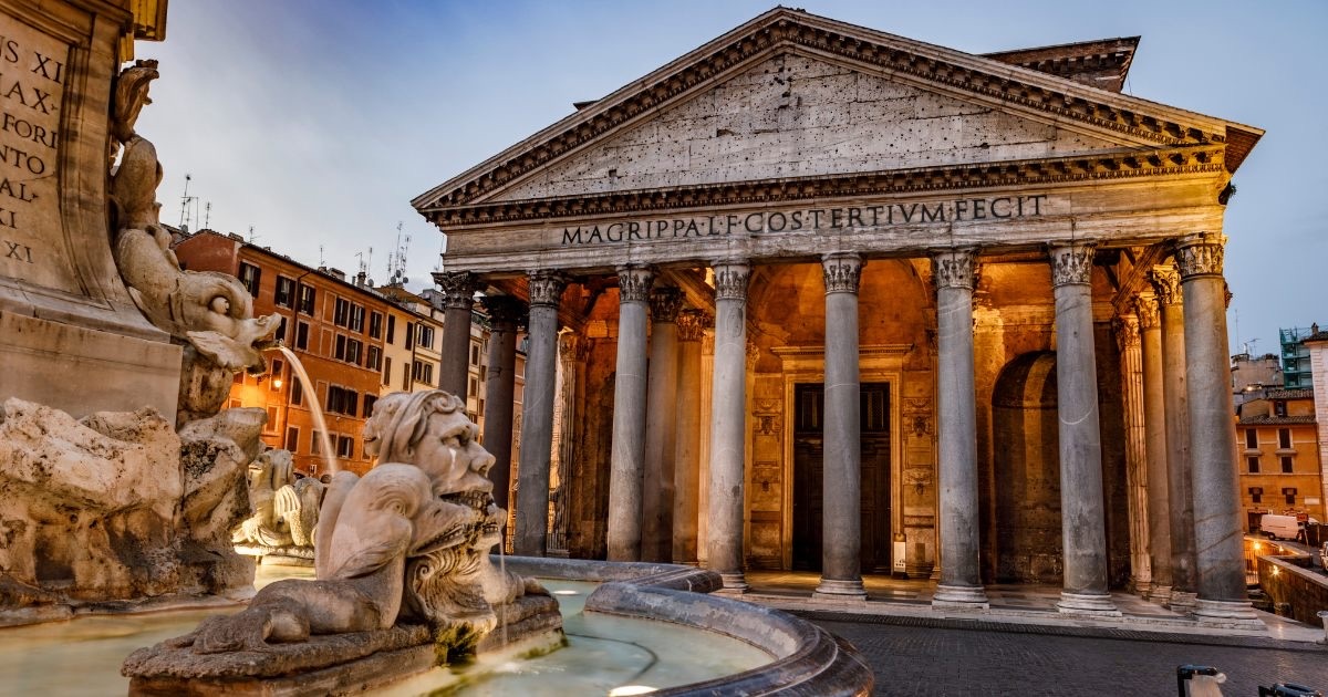 The Pantheon at dusk, its magnificent doors a gateway to nearly two millennia of history and the many eras it has witnessed