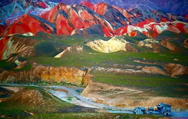 This expansive view captures the awe-inspiring contrast of colors and shapes found at Zhangye Danxia, one of China’s most photogenic natural wonders