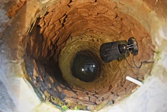 The 500-year-old well that Colin Steer discovered beneath his living room, still holding clear water and offering a glimpse into the past