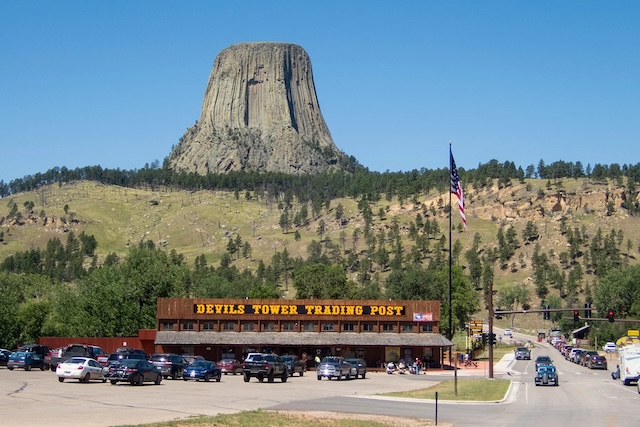 A bustling spot at the base of Devils Tower, where visitors can gather before exploring the natural wonder of this national monument