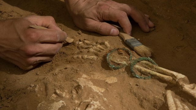 Archaeologists uncovering small metal artifacts, providing further insight into the lives of the Philistine people