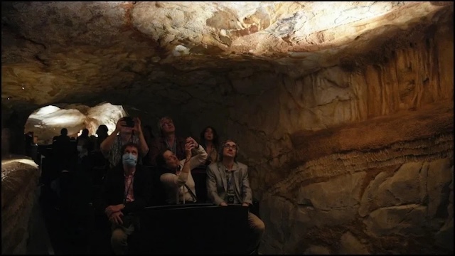 Visitors admire the detailed replica of the Cosquer Cave, offering a rare insight into the cave's extraordinary prehistoric artwork