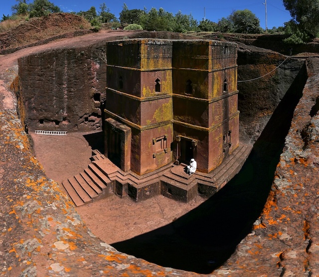 A panoramic view of the church's exterior, illustrating the massive scale and the precision of its construction, with intricate details on the walls