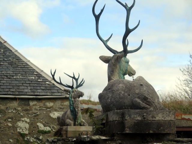 A closer look at the famous stag statues that stand proudly at the gates, symbolizing strength and heritage