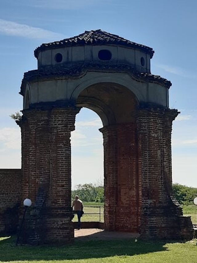 A breathtaking view of the Castle of Chignolo Po, showcasing its sprawling estate, historic architecture, and hidden gems like the Tea House nestled within its grounds