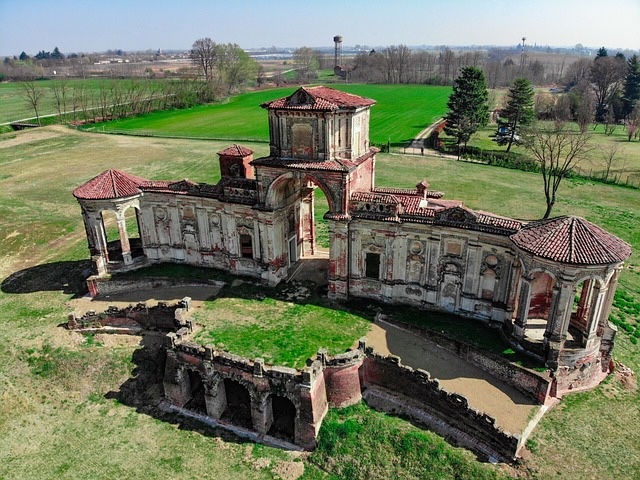 A wide-angle aerial shot of the Tea House, revealing its intricate layout and its harmonious integration with the surrounding natural landscape