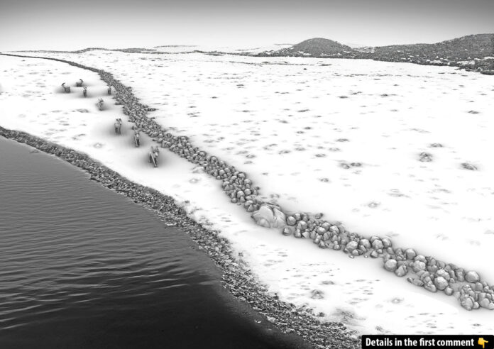 A 3D recreation reveals the wall and reindeer traps along the shore of an ancient, now-submerged lake, meticulously crafted from sonar data and photogrammetric modeling of the underwater site.