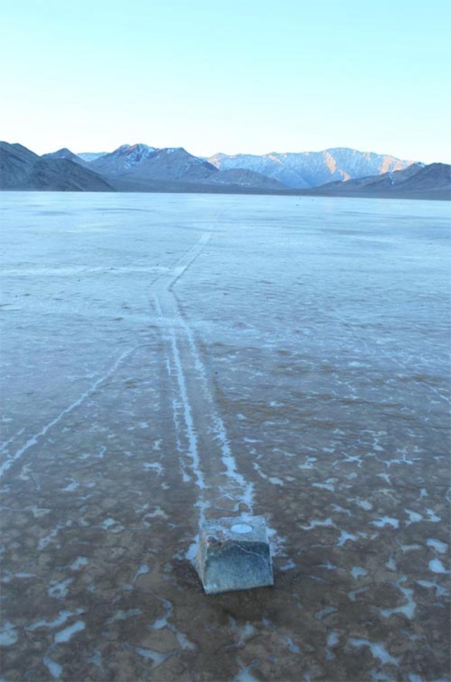 A GPS-equipped rock carving its path across the Playa—scientists embedded a tracking device within its core to uncover its secrets.