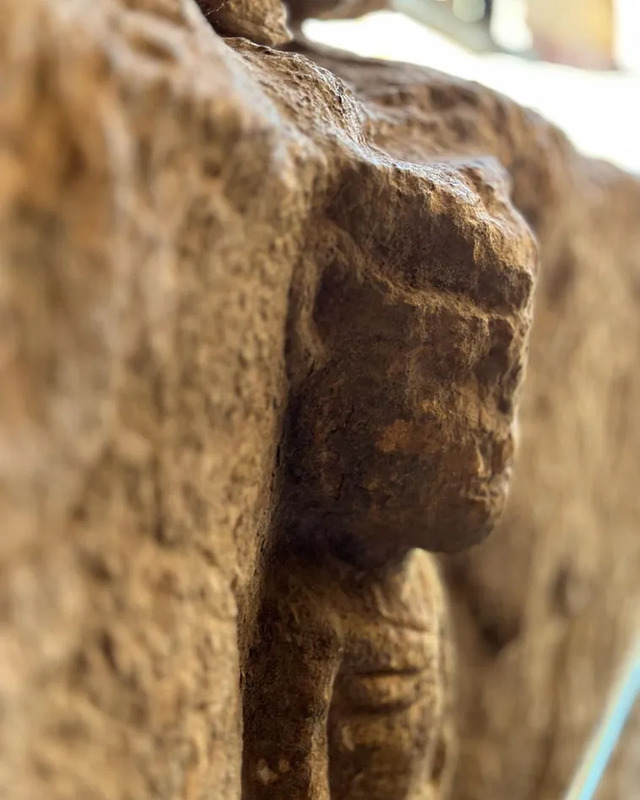 A close-up of a carved human figure discovered at Göbeklitepe, showcasing early artistic renditions of human anatomy. 