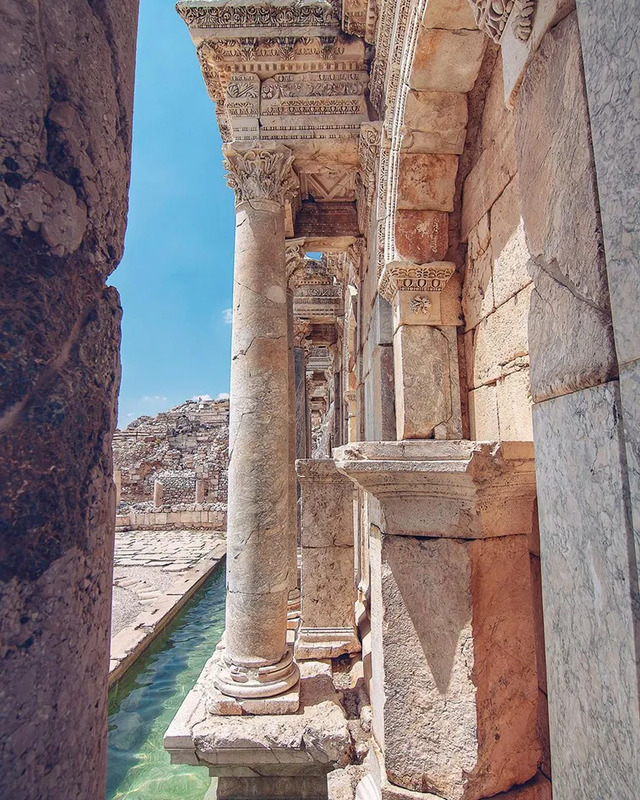 A close-up of the columns of the Nymphaeum, highlighting the intricate details of Roman architecture.