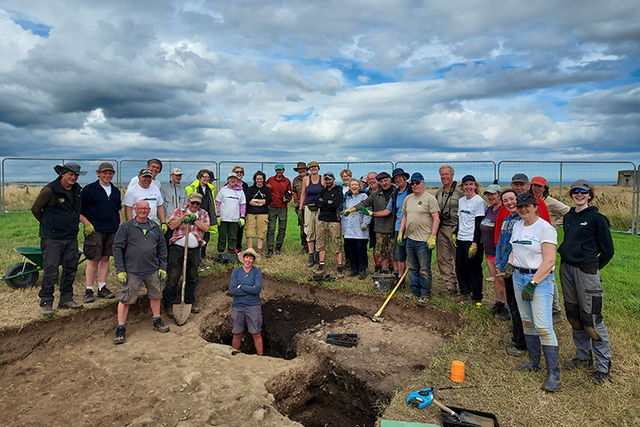 A dedicated team of archaeologists and volunteers collaborates during the fourth season of the community excavation at the historic Drumanagh site.