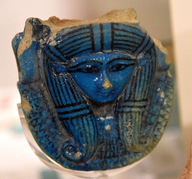 A faience carving of Hathor's head, once part of a sistrum's handle, dates back to the 18th Dynasty and hails from Thebes, now housed in the Petrie Museum of Egyptian Archaeology, London.