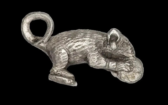 A finely crafted silver mouse pendant discovered at the Novae site, reflecting the artistic and cultural richness of Roman artifacts. Credit: Krzysztof Narloch.