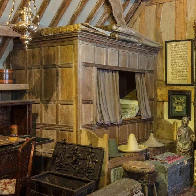 A medieval box bed was essentially a wooden sleeping enclosure that resembled a cupboard or alcove