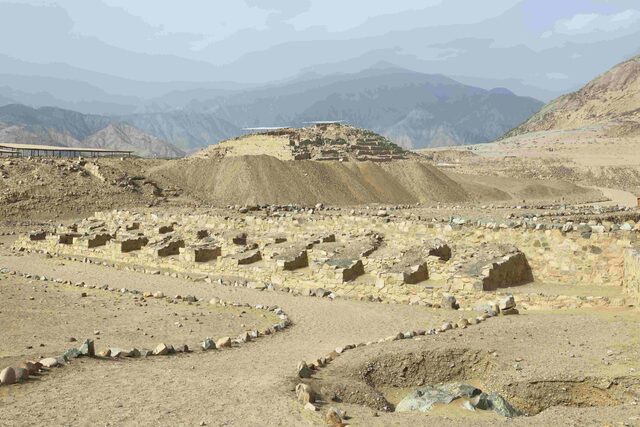 A panoramic view of Caral’s ruins, set against the stunning backdrop of the Andes mountains.