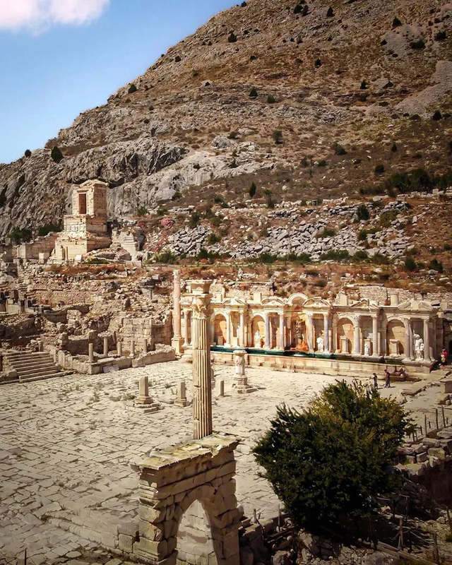 A panoramic view of Sagalassos, nestled in the Taurus Mountains, capturing the scale and beauty of this ancient city.