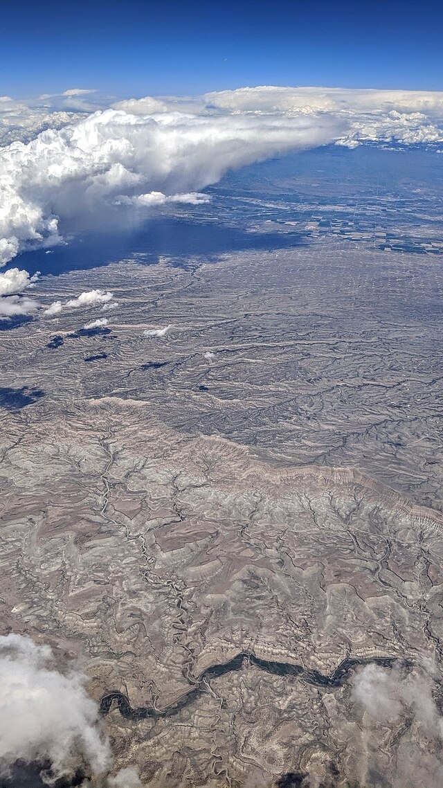 A sweeping view of Ninemile Canyon at North Franks Canyon, with natural gas wells visible in the distance, taken in May 2019.