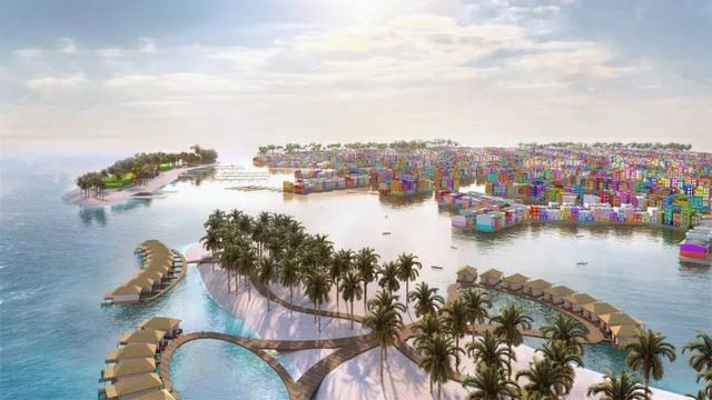 A view of the floating city’s beachfront, with lush palm trees and colorful housing adding to the tropical paradise.