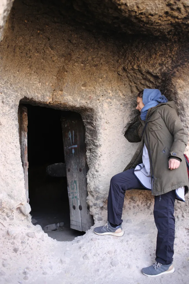 The village features a stone mosque carved into the mountain, a symbol of the spiritual resilience of its people.