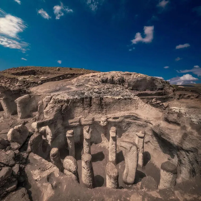 An aerial view of Karahantepe, showcasing its circular structures and T-shaped pillars, similar to those found at Göbeklitepe. This image highlights the architectural sophistication of the Neolithic era.