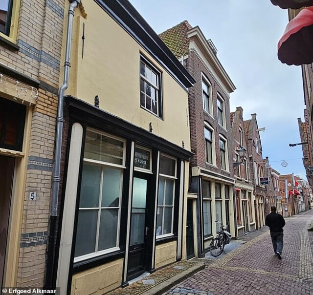 Achterdam, a renowned red-light district in Alkmaar, lies just 18 miles (30 km) north of Amsterdam. Pictured here is the building where the intriguing bone floor was discovered.