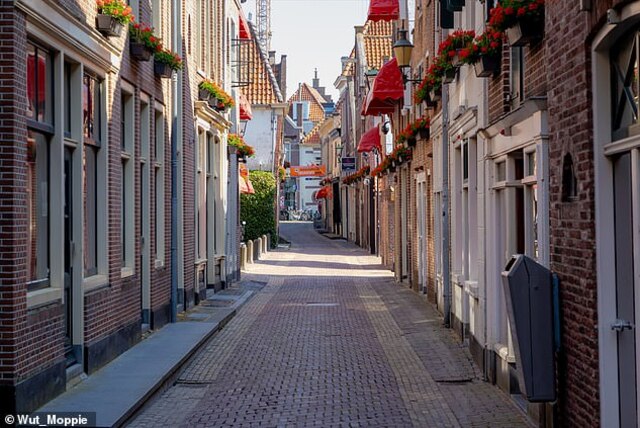 Achterdam (pictured), a 490-foot-long street with window-lined establishments on both sides, is nestled in the heart of Alkmaar’s historic center.