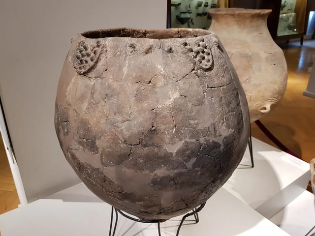 An Earthenware Vessel Decorated With Grape Motifs From Khramis Didi Gora, Georgia, Dates Back to the Sixth Millennium BCE, Highlighting the Ancient Origins of Winemaking.