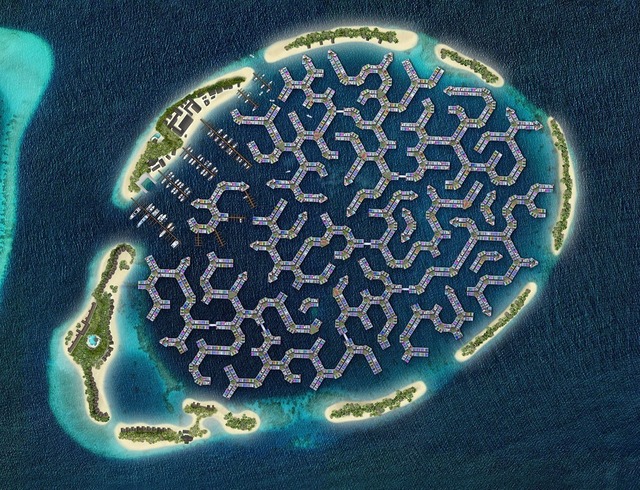 An aerial view of the intricate hexagonal layout of the Maldives floating city, designed to blend with the ocean environment.